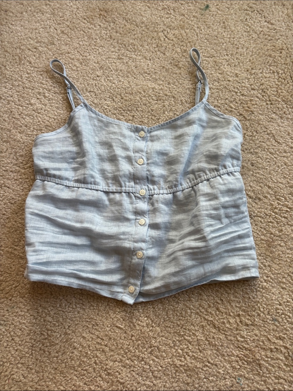blue linen button-up baby doll tank top from Brandy Melville.